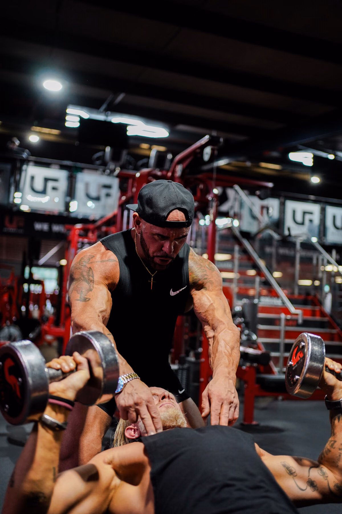 A coach talking a client through the next exercise